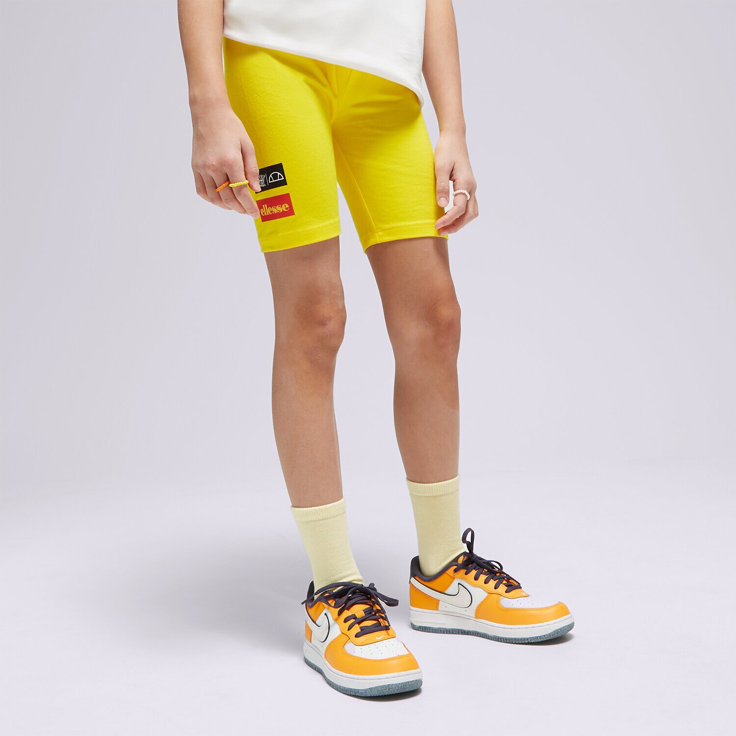 Otroški kratke hlače in obleke ELLESSE KRATKE HLAČE YELLOWISH JNR SHORT YELLOW S4ML15228606 rumena