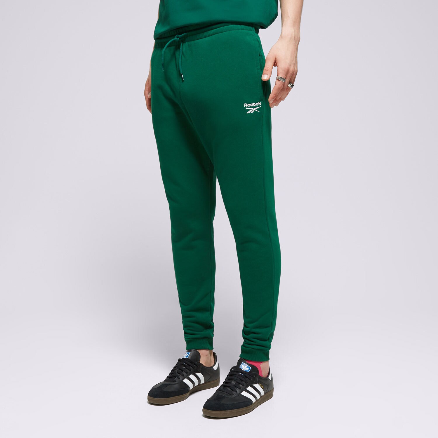 Moški hlače REEBOK HLAČE REEBOK IDENTITY SMALL LOGO 100076444 zelena