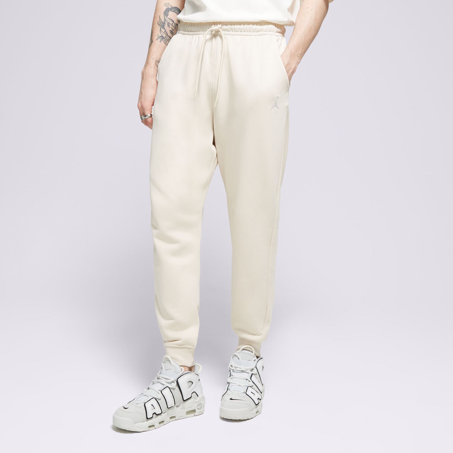 Moški hlače HLAČE M JORDAN ESS FLC PANT LB  FQ7761-203 bež