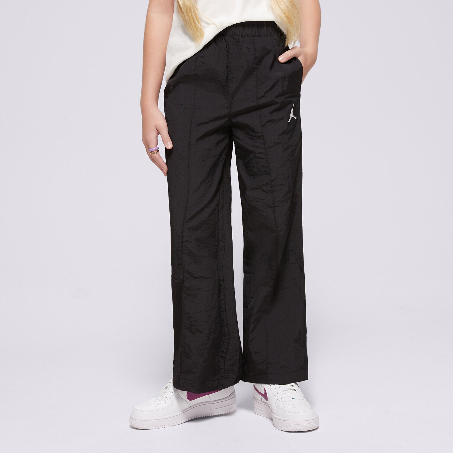 Otroški hlače JORDAN HLAČE JDG JUMPMAN WOVEN TAPING PANT GIRL 45D346-023 črna