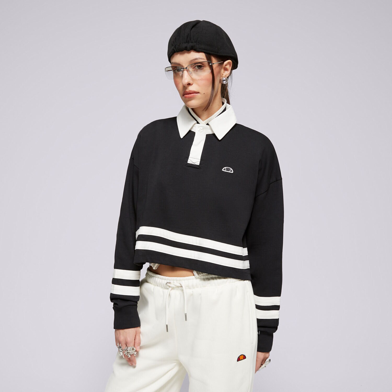 Ženska majica s kratkimi rokavi ELLESSE POLO SOMBRA CROPPED RUGBY MAJICA BLK SGX21025011 črna
