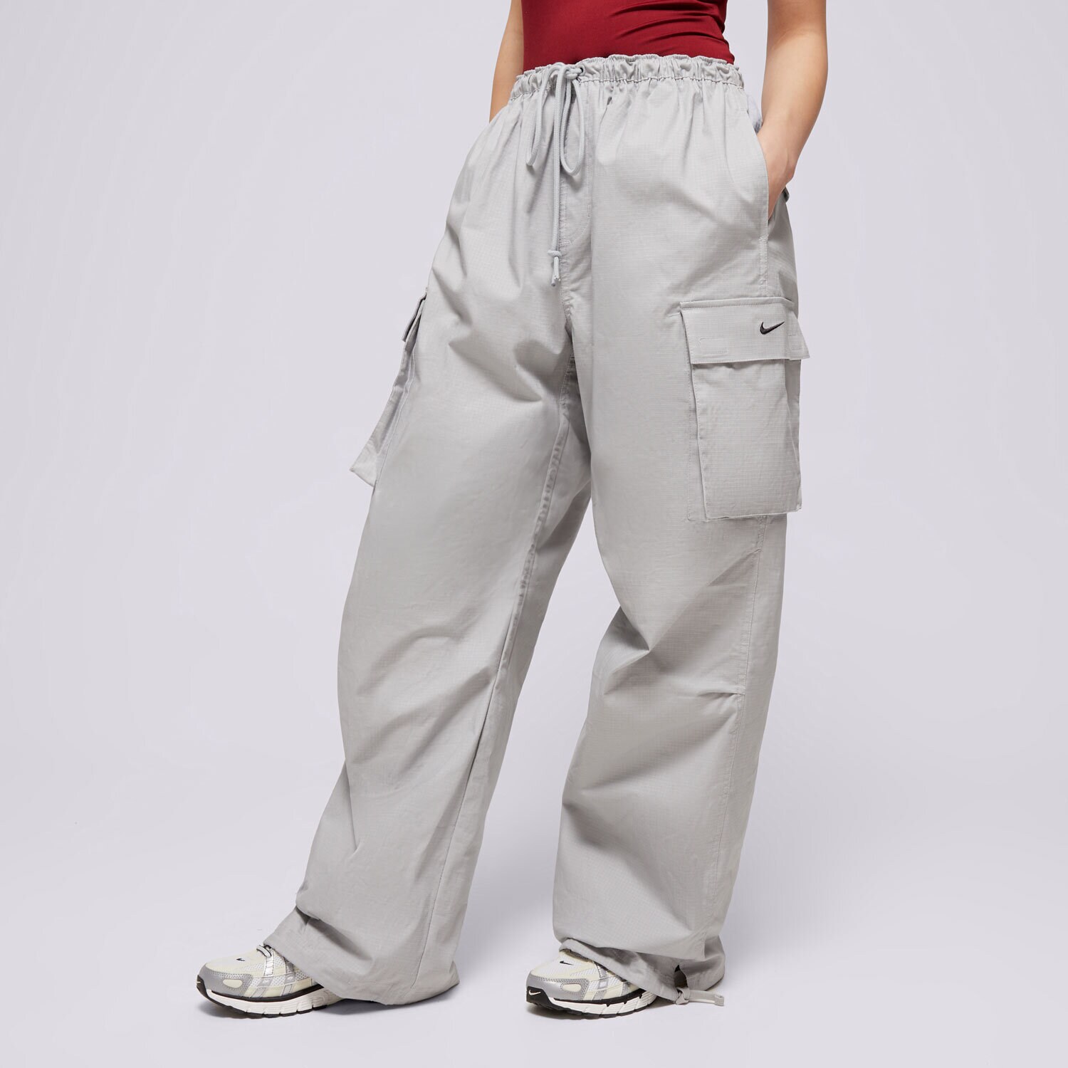 Ženske hlače NIKE HLAČE W NSW DANCE CARGO PANT FV7520-077 siva