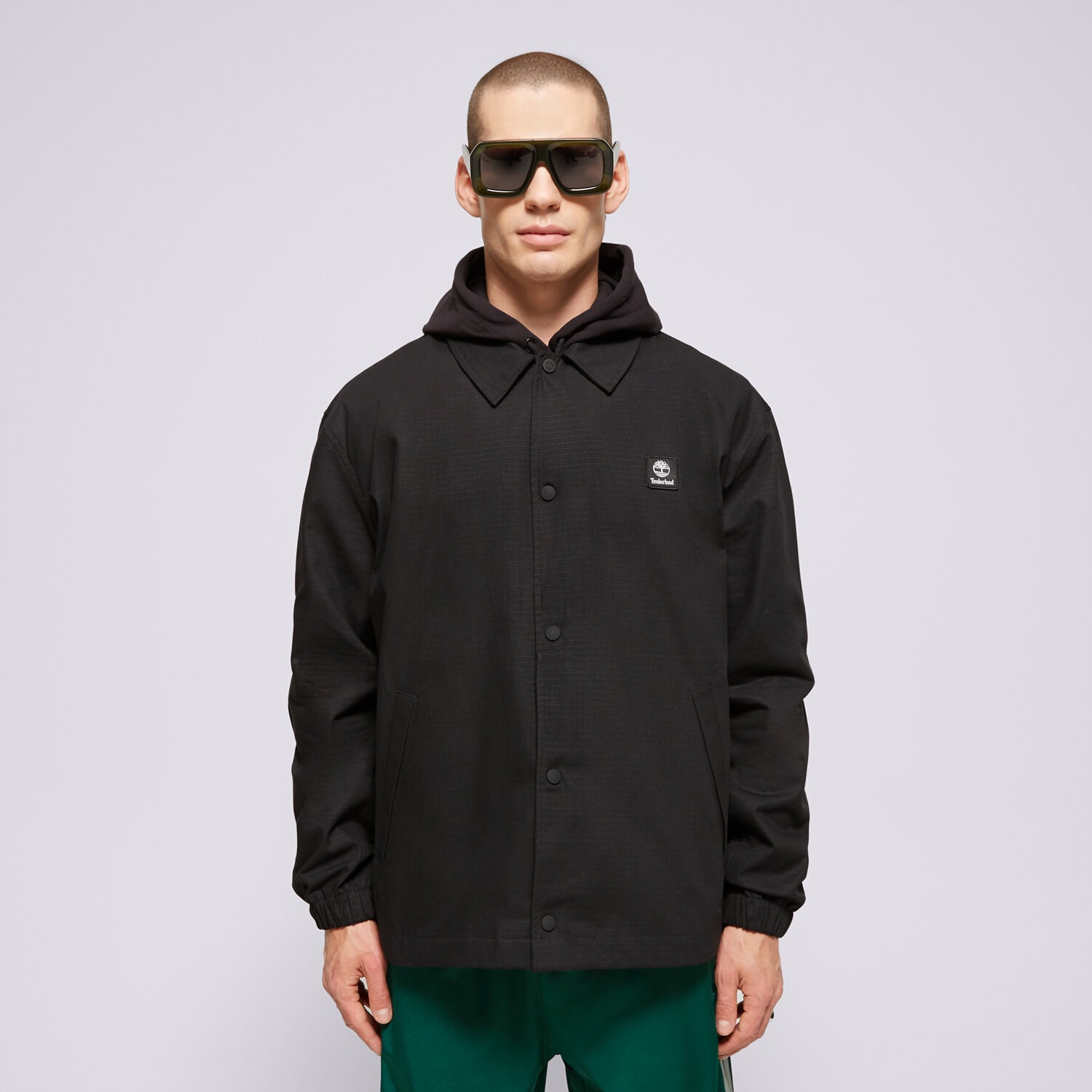 Moška jakna za prehodni čas TIMBERLAND JAKNA WOVEN BADGE RIPSMAJICA COACH JACKET BLACK TB0A6FA90011 črna