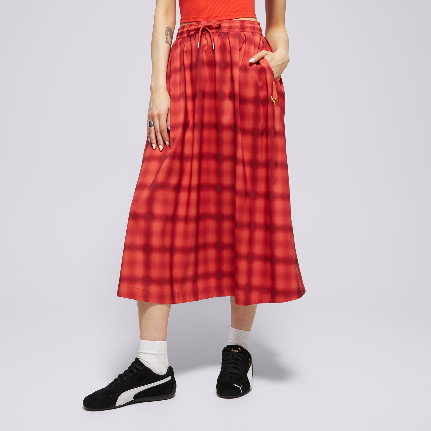 Ženska obleka PUMA KRILO WOVEN MIDI AOP PLEATED SKIRT 629795 15 rdeča