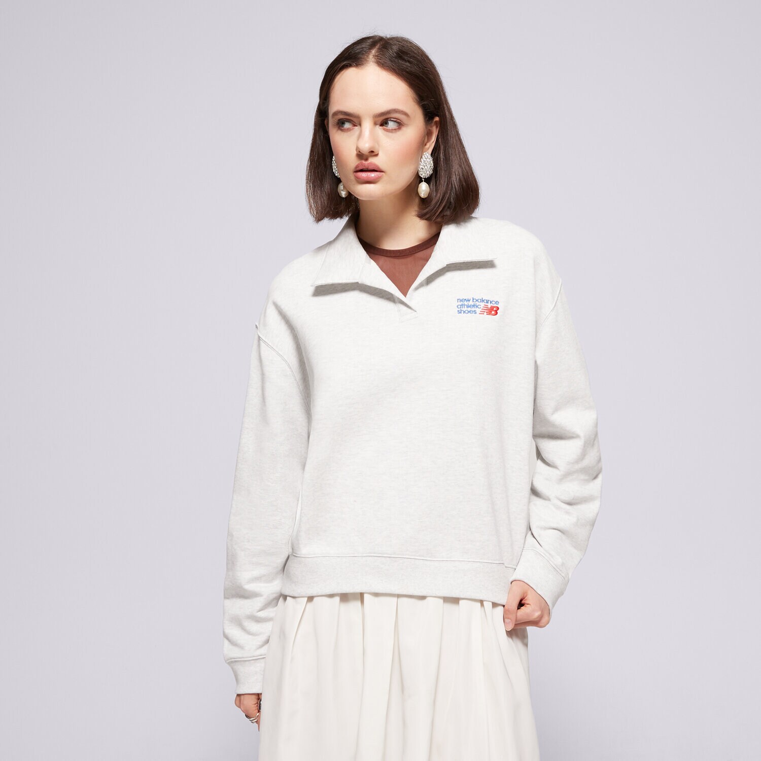 Ženski pulover NEW BALANCE JOPICA FRENCH TERRY POLO WT51513AHH siva
