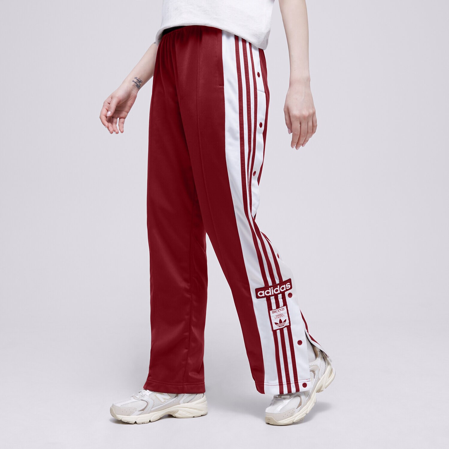 Ženske hlače ADIDAS HLAČE ADIBREAK TP IB7297 rdeča