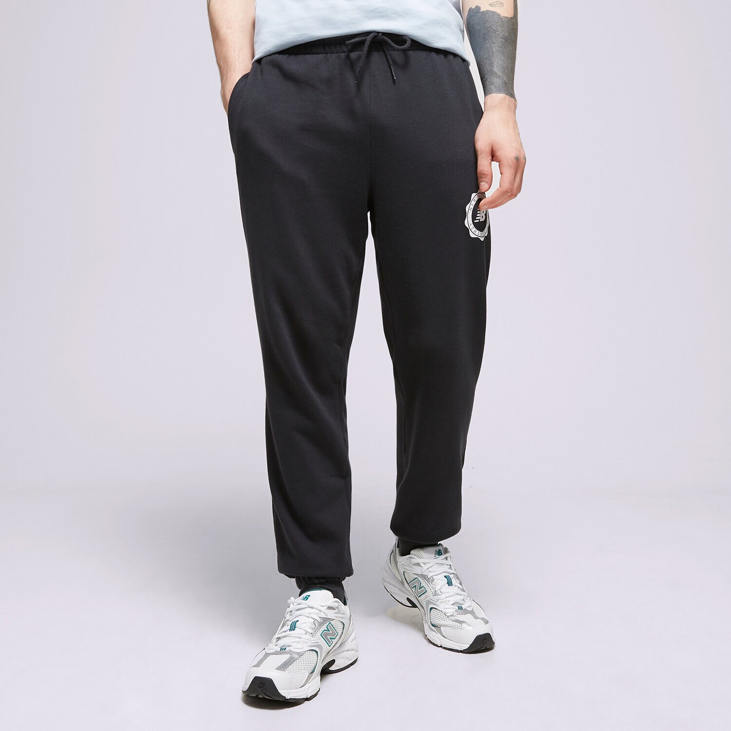 Moški hlače NEW BALANCE HLAČE NB SPORT SEASONAL MP31902 črna