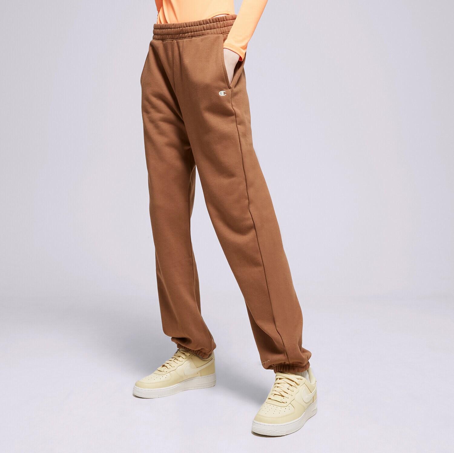 Ženske hlače CHAMPION HLAČE ELASTIC CUFF PANTS 116219MS519 rjava