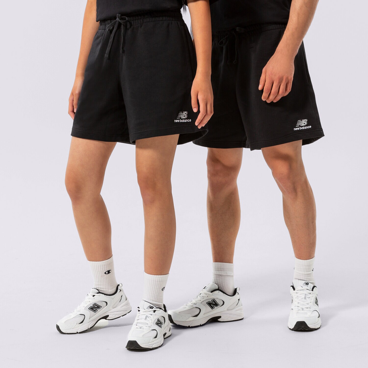 Ženske kratke hlače NEW BALANCE KRATKE HLAČE NB ESSENTIALS   UNI-SSENTIALS FLEEC US21500BK črna