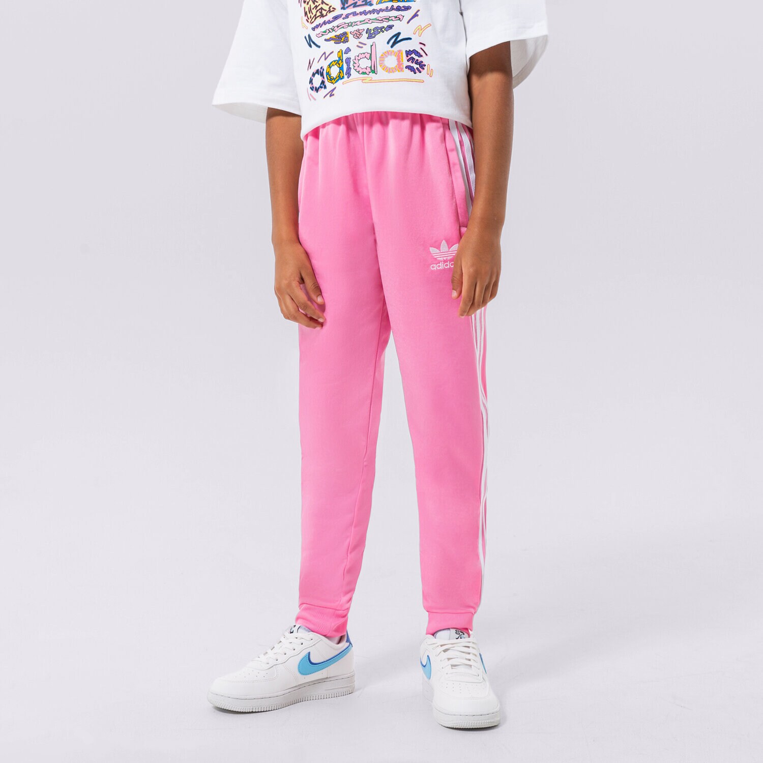 Otroški hlače ADIDAS HLAČE SST TRACK PANTS GIRL HK0329 roza