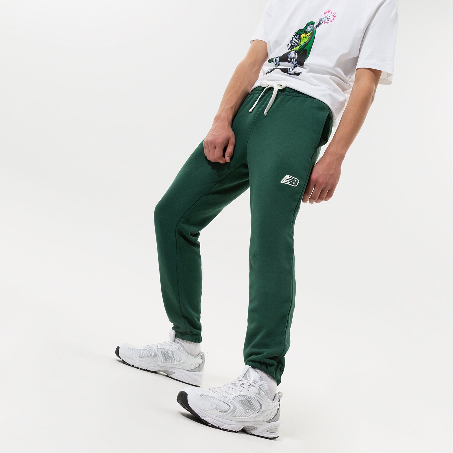 Moški hlače NEW BALANCE HLAČE NB ESSENTIALS FLEECE JOGGER MP23504NWG zelena