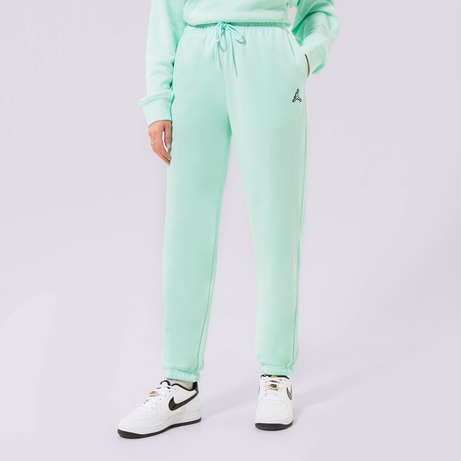 Ženske hlače JORDAN HLAČE ESSENTIAL JOGGERS DN4575-379 mint