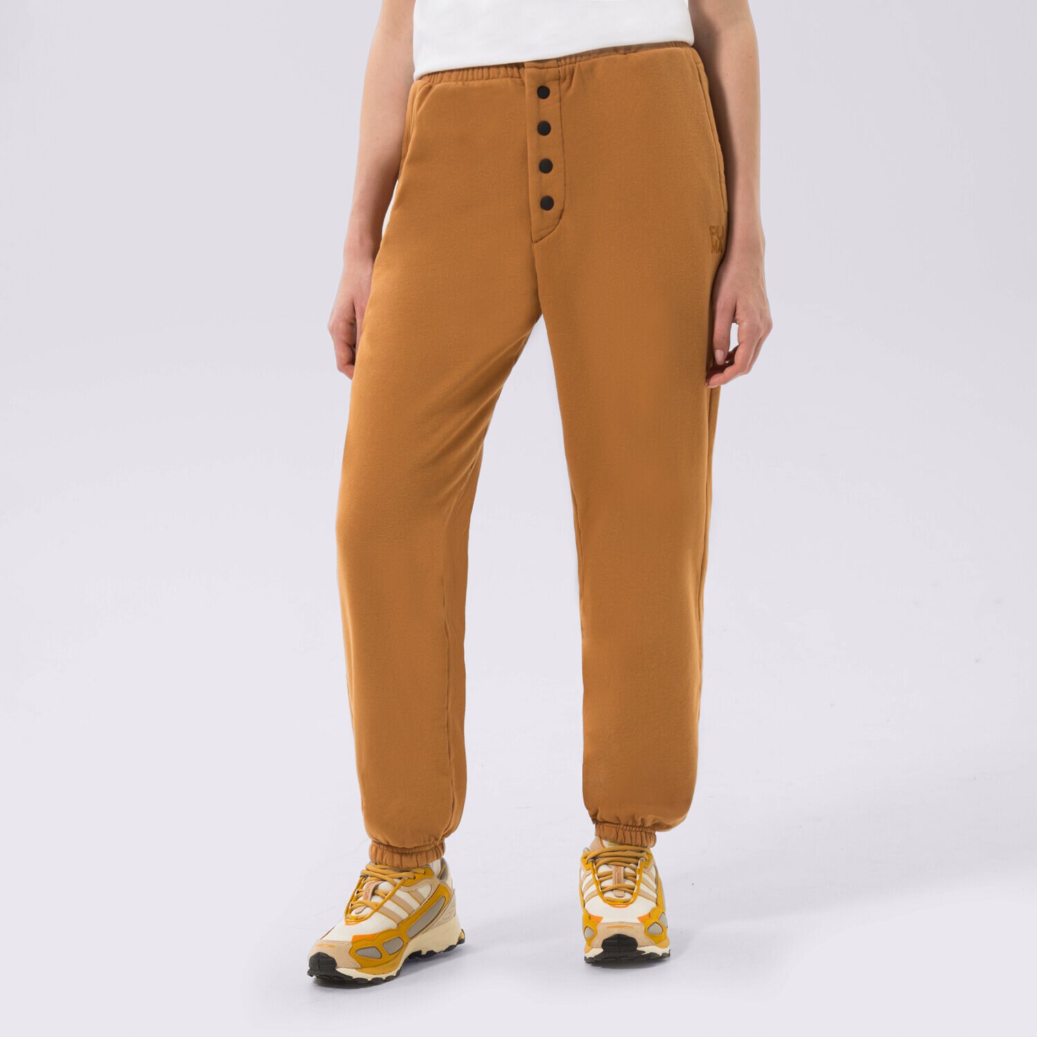 Ženske hlače PUMA HLAČE PUMA INFUSE SWEATPANTS 535644-74 gorčična