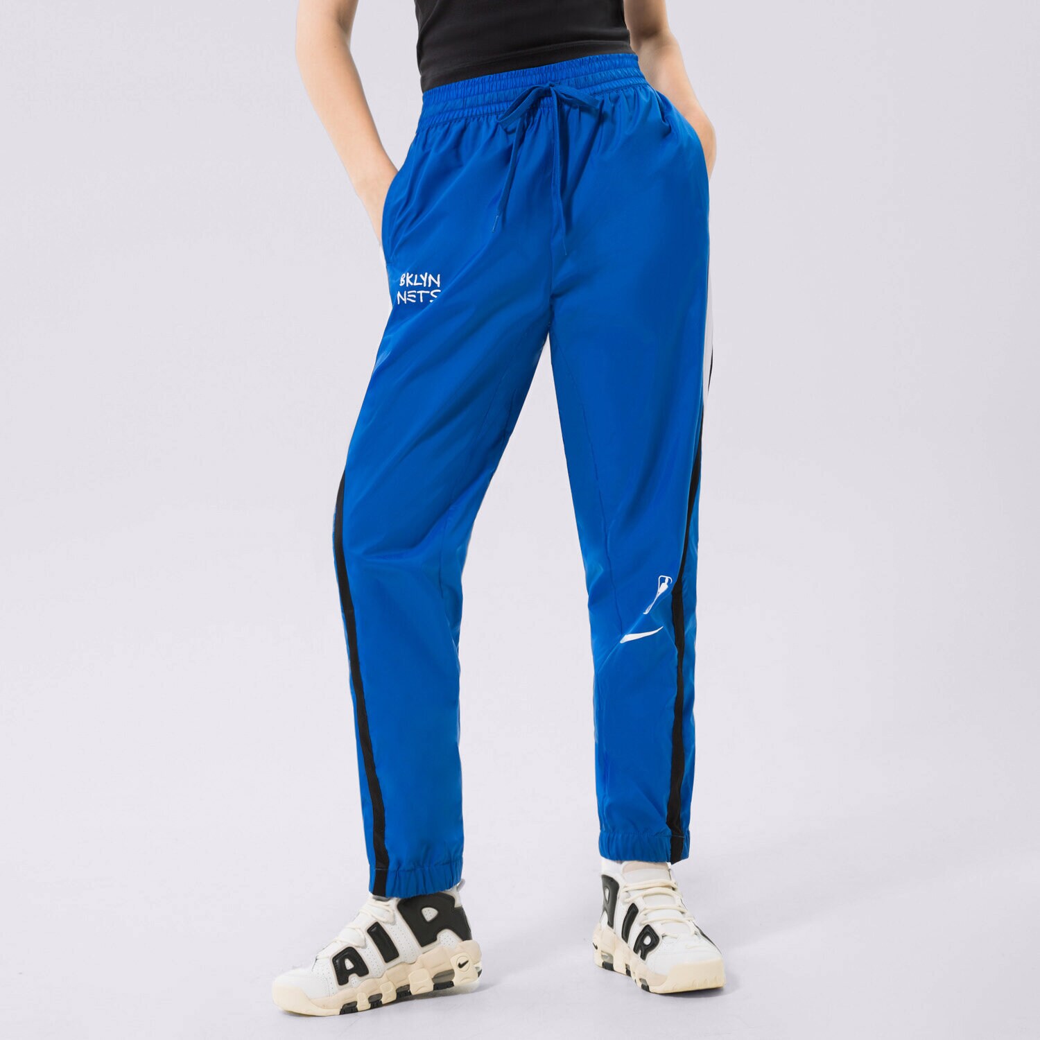 Ženske hlače NIKE HLAČE BKN W NK TRKST PANT CTS CE NBA DO0129-463 modra